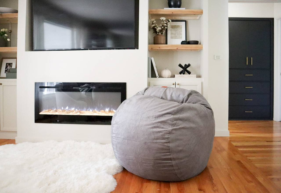 Snuggle up in style with our Grey Chenille beanbag—perfect for any modern home.