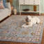 Tapis oriental en polyester bleu / ivoire Xanthi-128544300