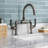 Kingston Brass Whitaker Two-Handle 2-Hole Deck Mount Bridge Bathroom Faucet with Pop-Up Drain-50134291