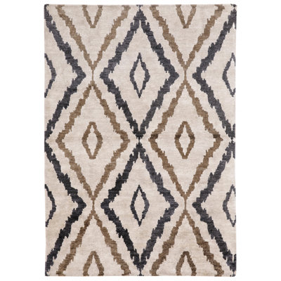 Tapis géométrique beige en laine noué à la main