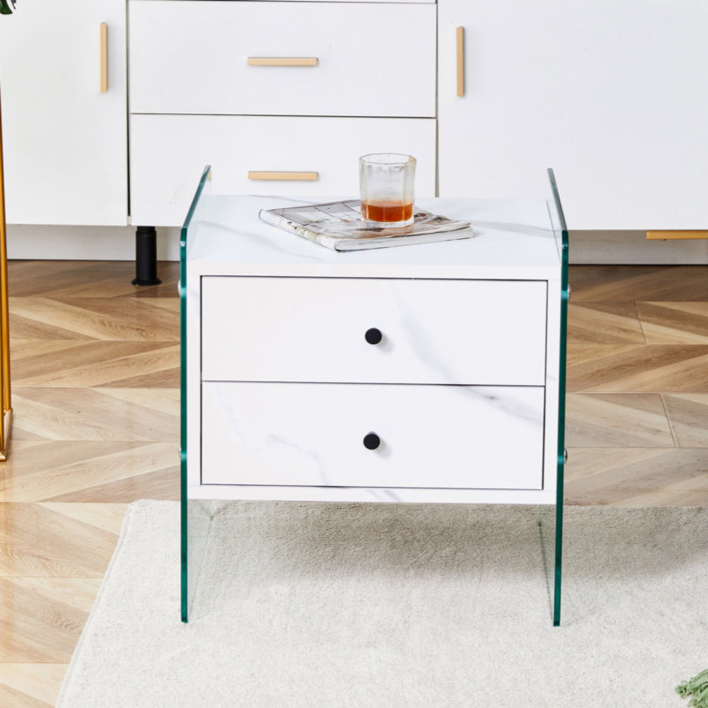 Double-Drawer Bedside Table.The Board Surface Is MDF With White Grain Sticker, And Both Sides Are Tempered Glass. The Design Is Simple And Elegant, With Excellent Storage Functions.W1512P285050