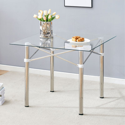 Élégante table carrée en verre extensible - Verre trempé transparent de 36 po, pieds en métal argenté. Pieds en métal télescopiques, plateau de table carré en verre transparent, raccord pour ventouse.