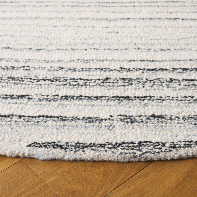 Nikhel Ebony Hand Tufted Performance Floral Rug, Round 6'