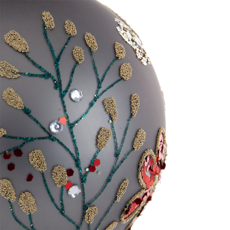Ornement boule de verre à paillettes