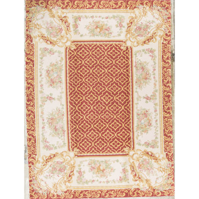 Tapis rouge et ivoire noué à la main de haute qualité