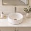 Lavabo-vasque rond en céramique blanche de 31,5 cm (12,4 po), modèle moderne à poser sur le comptoir, avec bonde de 4,4 cm (1,75 po).