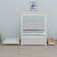 Le lit plateforme à baldaquin avec lit gigogne et tiroirs offre un rangement peu encombrant et un style moderne personnalisable