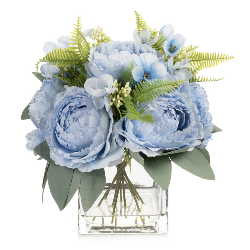 Arrangement de pivoines artificielles dans un vase en verre avec de l'eau artificielle (bleu), Bleu