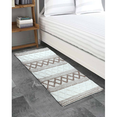 Tuule Geometric Hand Woven Indoor / Outdoor Area Rug