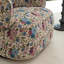 Fauteuil demi-tonneau pivotant rembourré Bryonie