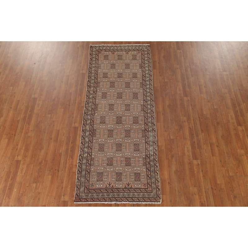 Tapis à motif géométrique 3x9