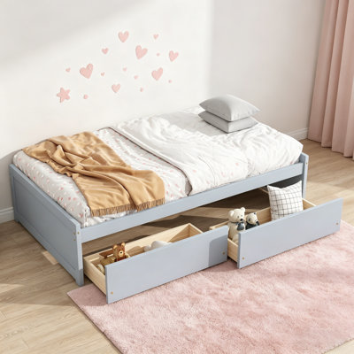 Lit simple avec tiroirs spacieux, structure en bois d'hévéa massif, idéal pour les chambres d'enfants et conception peu encombrante