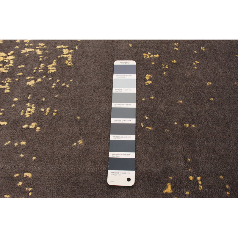 Tapis gris foncé en laine noué à la main