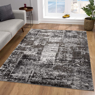 Tapis à motif abstrait gris / noir