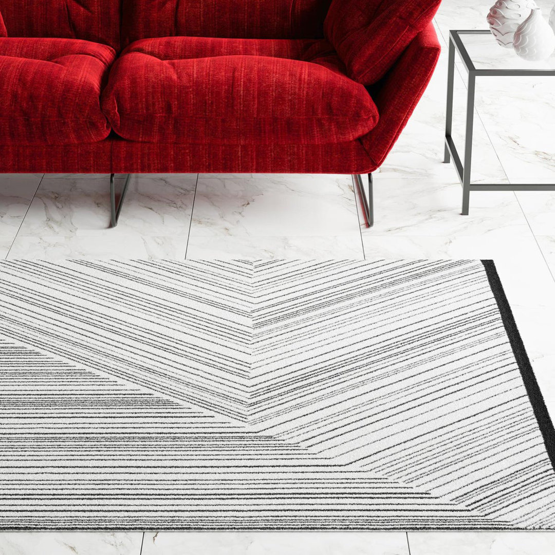 Bralin Geometric Machine Made Polyester Area Rug in Black/White Wade Logan® Rug