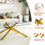 Modern rectangular glass coffee table with clear tempered top and metallic gold legs for living room display