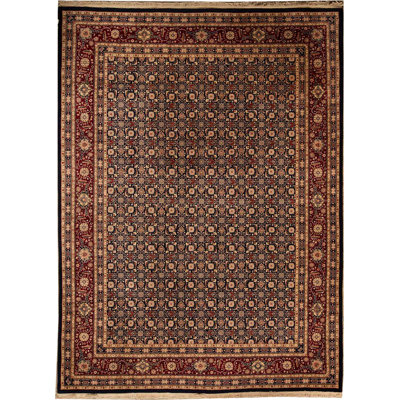 Tapis bleu marine et vin de haute qualité noué à la main