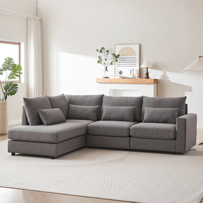 100.2" L-shaped linen sofa with ottoman