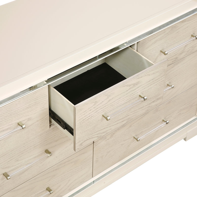 Commode moderne et glamour à 7 tiroirs en bois brun clair avec miroir, poignées en acrylique et bordure biseautée - Meuble de rangement pour chambre à coucher