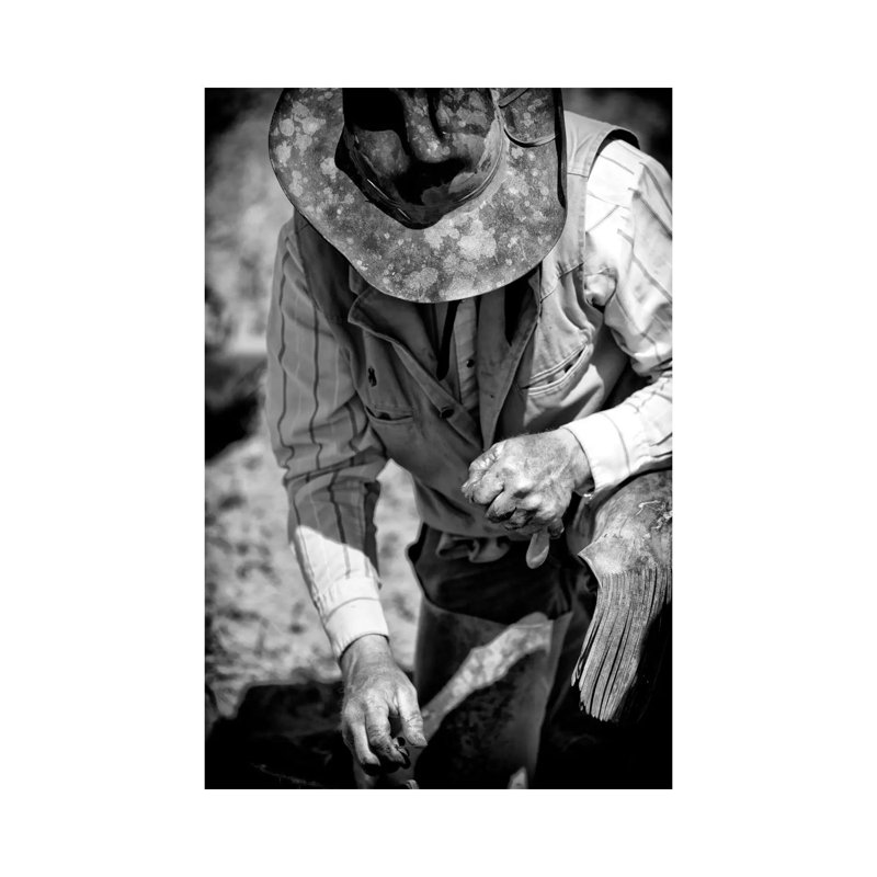 Cowboy And His Hat by Dan Ballard - Wrapped Canvas Print, 20.32 cm H x 30.48 cm W