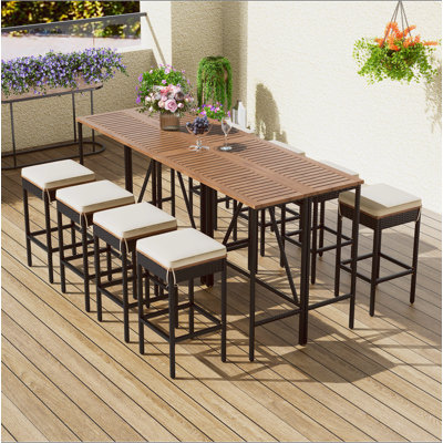 GO 10-Piece Outdoor Acacia Wood Bar Height Table And Eight Stools With Cushions, Garden PE Rattan Wicker Dining Table, Foldable Tabletop, High-Dining Bistro Set, All-Weather Patio Furniture