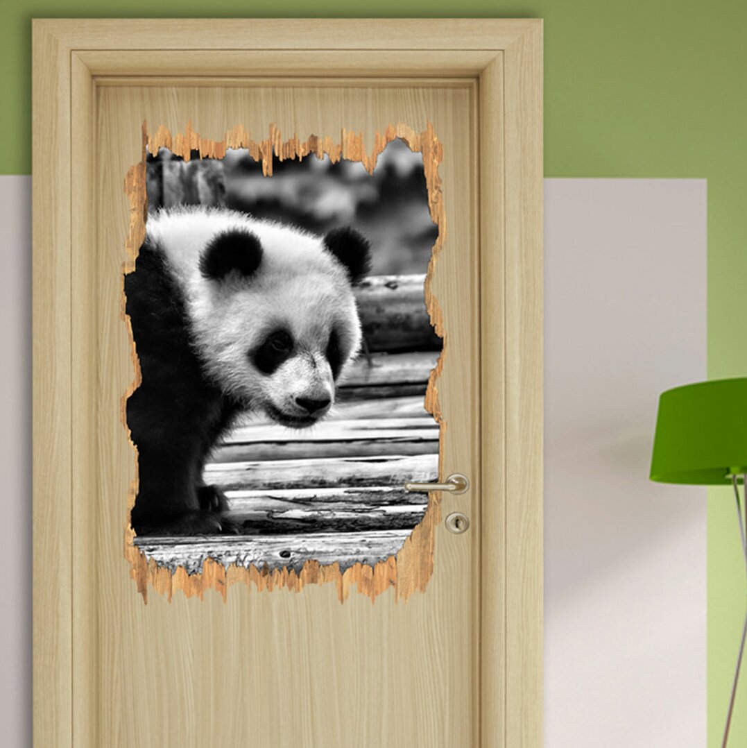 Wandtattoo Niedlicher, junger Panda auf Holzstämmen in Monochrom