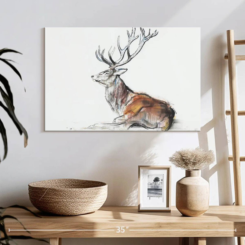 Cerf Brampt assis, H 16 po x l 24 po