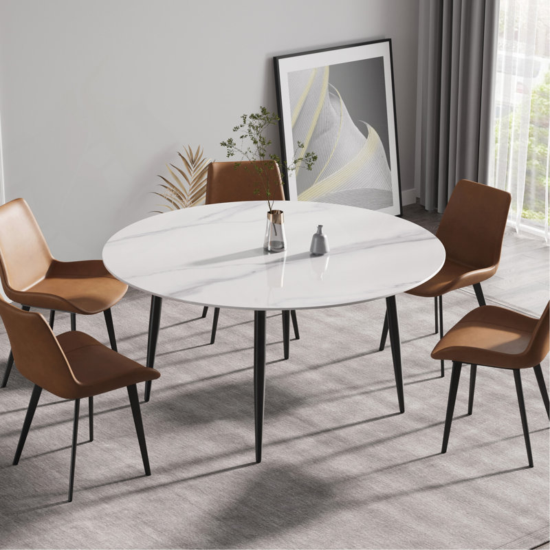 Table de salle à manger moderne en pierre artificielle ronde avec pieds en métal noir - peut accueillir 6 personnes. (Seulement tables, pas de chaises)