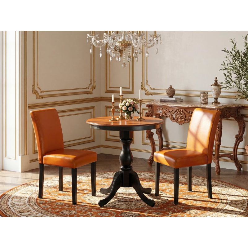3 Piece Dining Set Contains a Round Dining Table with Pedestal and 2 Baked Bean Faux Leather Upholstered Parson Chairs, Black & Cherry