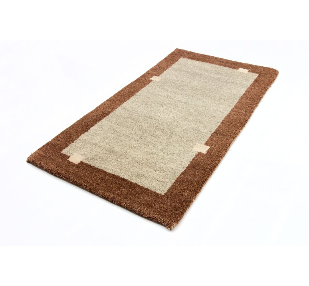 Handgefertigter Teppich Tennyson aus Wolle in Beige