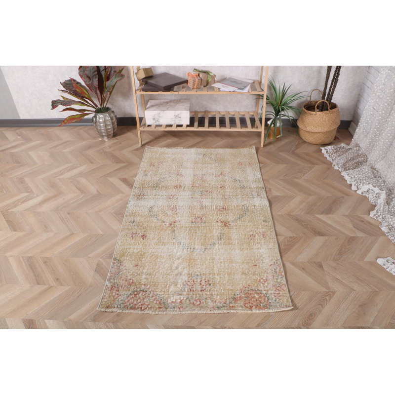 Tapis turc noué à la main dans des tons chauds en laine pure pour un look rétro classique