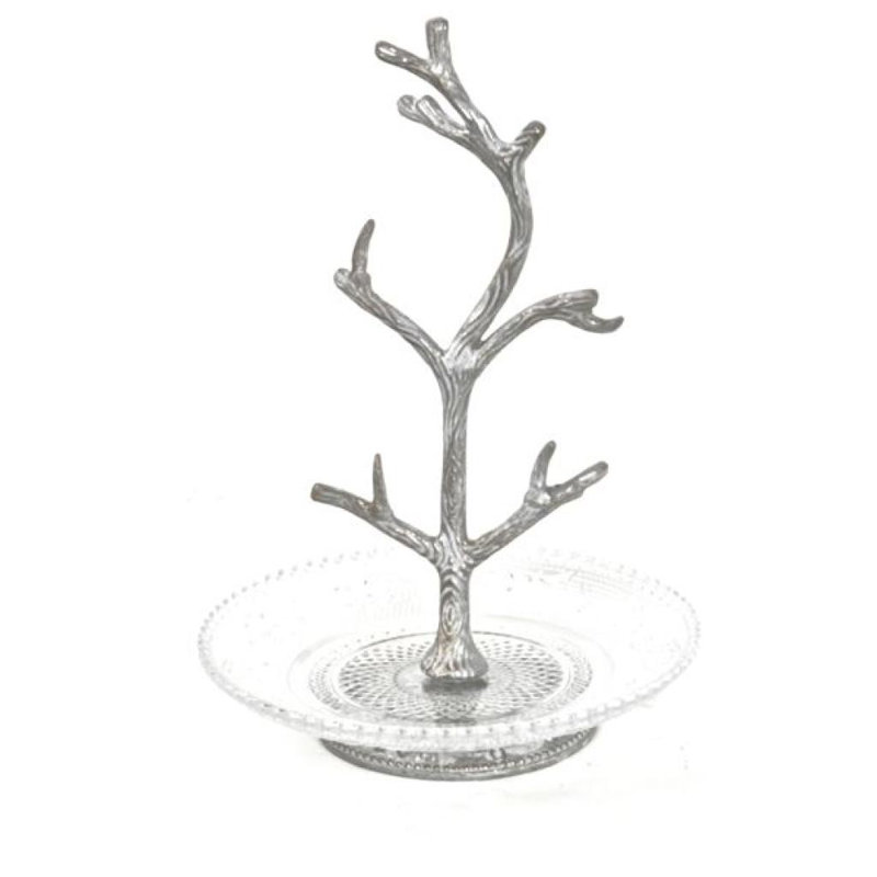 Porte-bijoux en métal sur une plaque de verre