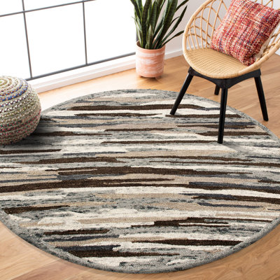 Tapis rond brun / gris en laine touffeté à la main à motif camouflage Joolia