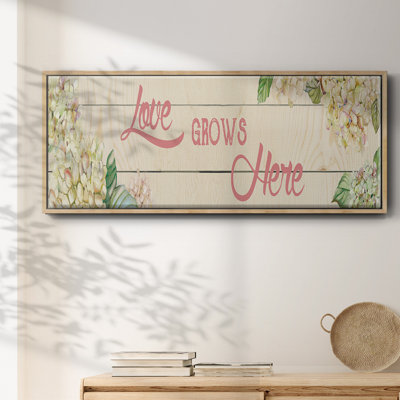 «Love Grows Here», toile encadrée