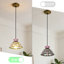 Luminaire suspendu simple en verre rose à intensité variable