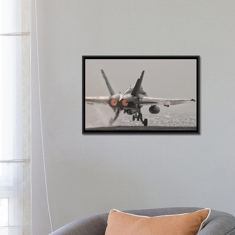 " An F/A-18C Hornet Takes Off From USS George H.W. Bush " by Giovanni Colla, 18" H x 26" W x 1.5" D, Black Framed Canvas