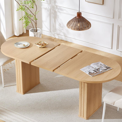 63"–79" Extendable Oval Dining Table with Fluted Base