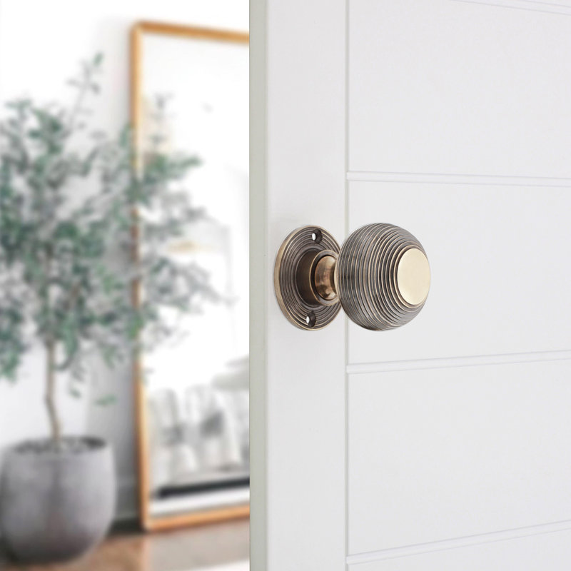Beehive 50mm Rim/Mortice Door Knob, Aged Brass