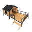 Pavillon de style chalet avec toit en métal et bois