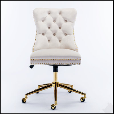 Fauteuil de bureau luxueux rembourré en velours capitonné avec base en métal doré et fonction pivotante réglable