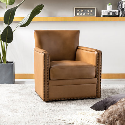 Fauteuil club pivotant en cuir Tessler