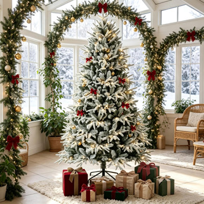 Sapin de Noël artificiel de 1,80 m, pré-illuminé et saupoudré de neige, avec feuillage en PE/PVC, lumières DEL blanc chaud et branches articulées pour une décoration intérieure festive.