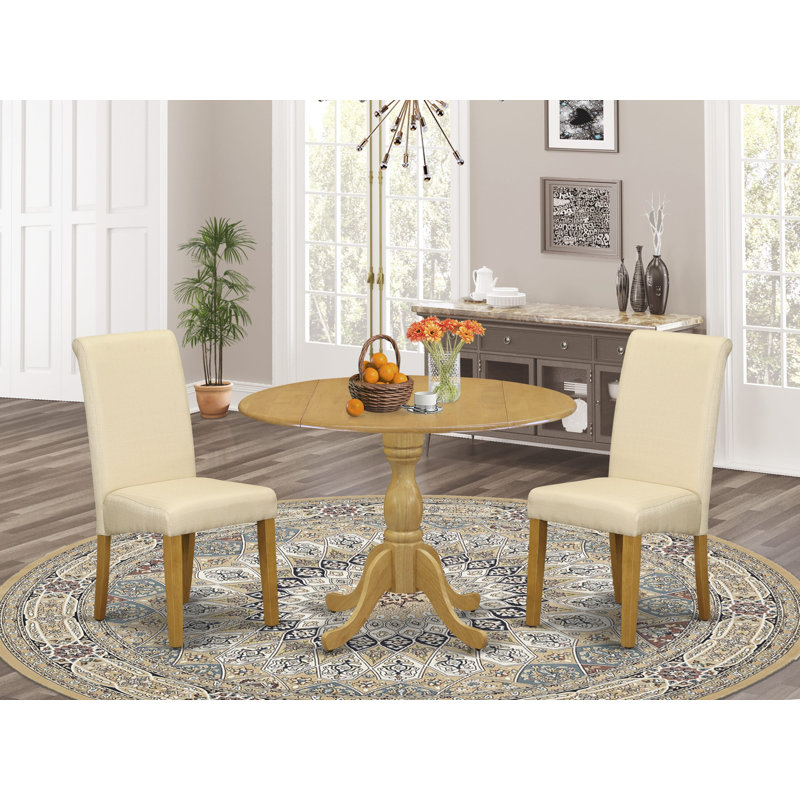 L'ensemble de table de salle à manger 3 pièces contient une table de cuisine ronde avec Dropleaf et 2 chaises de salle à manger Parson en tissu beige clair, chêne
