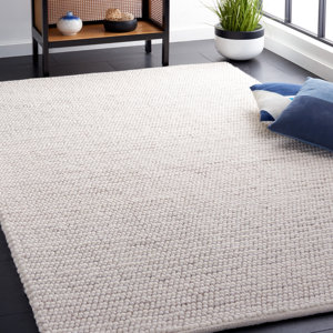 Charvik Handmade Area Rug in Ivory/Beige