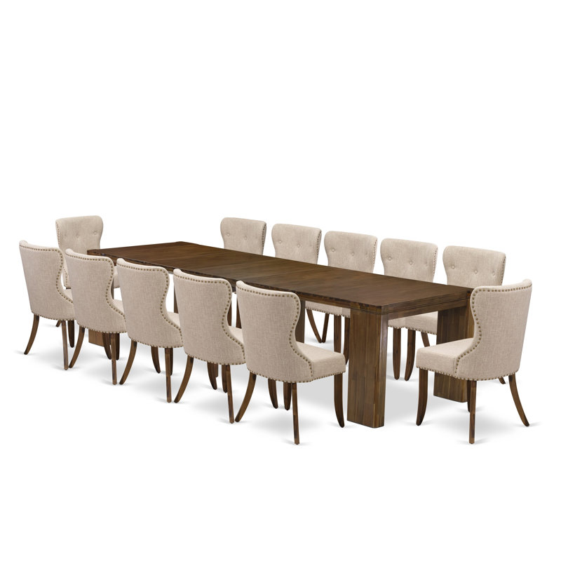 L'ensemble de table de cuisine 13 pièces comprend une table de cuisine rectangulaire extensible et 12 chaises de salle à manger, noyer antique