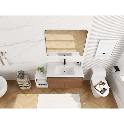 Meuble-lavabo mural peu encombrant avec lavabo en résine intégré et rangement modulaire