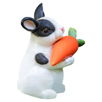 Statue de lapin Marieme à énergie solaire avec une carotte