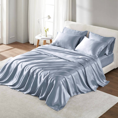 Draps simples en satin - froissés - luxueux. Convient aux matelas de 16 po. Comprend 1 drap-housse plat et 4 taies d'oreiller. Doux et soyeux. Peau gracieuse. Literie gracieuse.