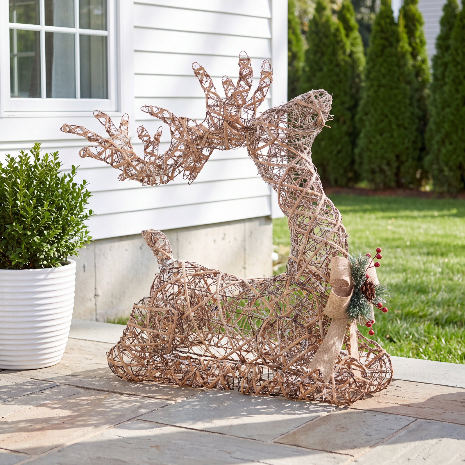 Natural Rattan Sitting Reindeer, Pre-Lit with 50 Warm White LED Lights, Plug In, 31.49"H x 9.44"W x 32.67"D