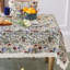 Nappe rectangulaire 152 x 264 cm en coton à motifs floraux sauvages et pompons